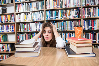 photo credit: Sad lady in library via photopin (license)