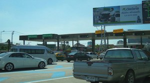 photo credit: David McKelvey <a href="http://www.flickr.com/photos/94735786@N00/7052989801">Toll booths, Sri Rat Expressway, Bangkok, Thailand</a> via <a href="http://photopin.com">photopin</a> <a href="https://creativecommons.org/licenses/by/2.0/">(license)</a>